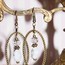 Boucles d'oreille cadre ovale perles verre forme fleur et cristal montage couleur bronze